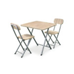 Compact 3-Piece Wood & Metal Folding Table Set (Side View). Key Bullet Points Space-Saving Design: Folds completely flat for quick setup, simple storage, and easy portability in tight spaces. Durable Construction: Features a light wood laminate top paired with a heavy-duty, silver powder-coated metal X-frame. Versatile Utility: Works as a compact dining set, temporary work-from-home desk, or activity table for small apartments. Floor Protection: Non-marring black rubber end caps preserve floors and prevent slipping during use.